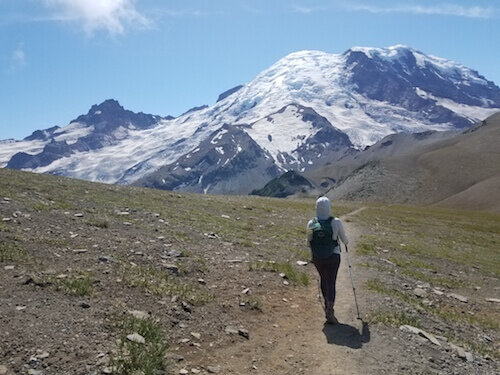 Hiker on a trail in Mount Rainier National Park